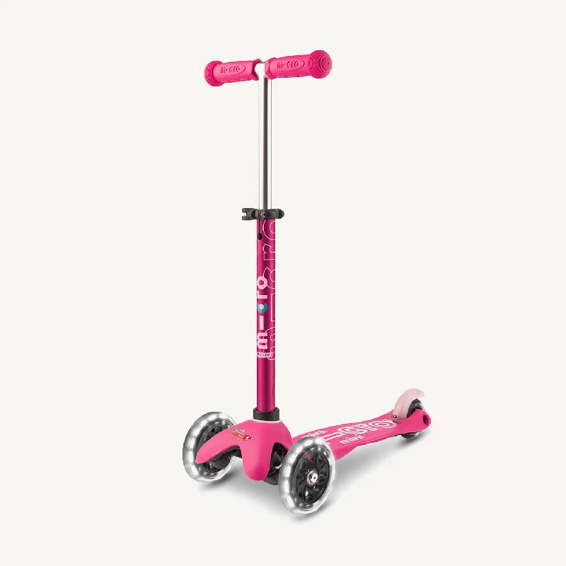 Travel-Friendly Scooter for Frequent Flyers-Micro Scooters Mini Micro Scooter Deluxe LED - Pink